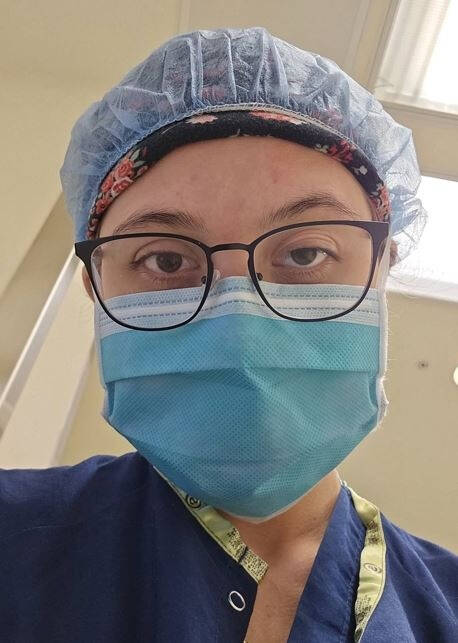 Courtney Myers selfie in medical scrubs